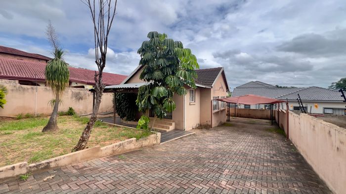 For Sale: 3-Bedroom House in West Acres Ext 13 with carports and entertainment patio.