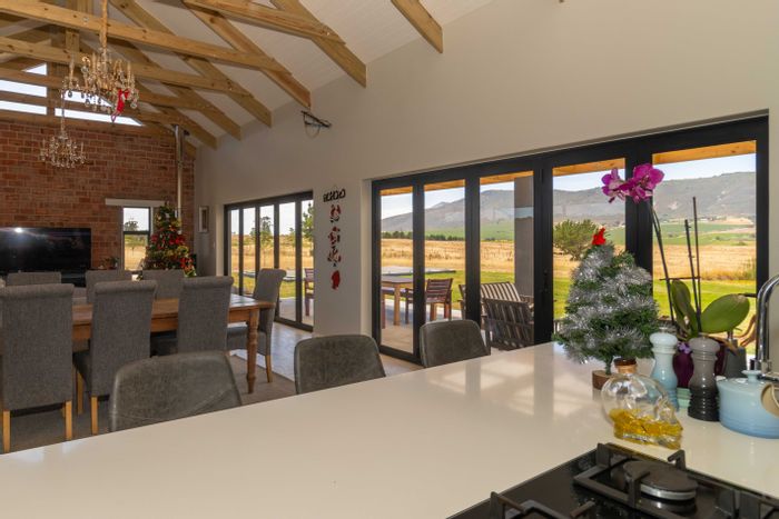 Paarl Rural Small Holding For Sale: Equestrian estate with solar, pool, and stunning views.