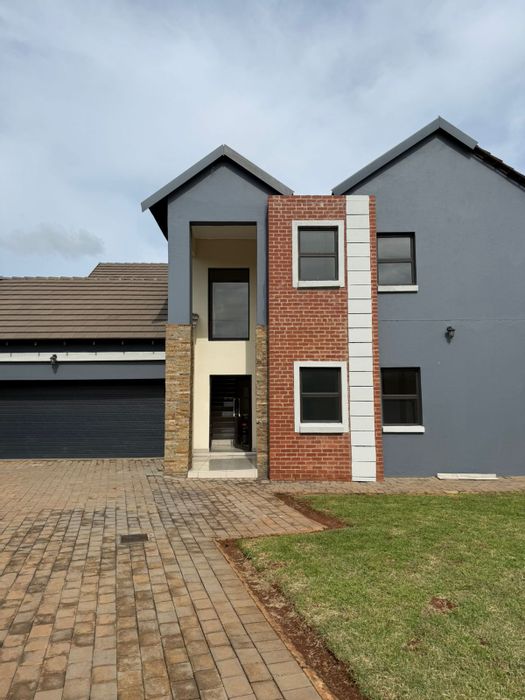 For Sale: Spacious 4-Bedroom House in Secure Melodie Complex with Patio and Garage.