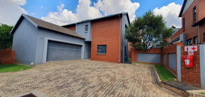 4-Bedroom Townhouse To Rent in Amorosa with garden, garage, and backup generator.