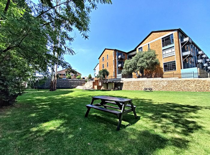 Braamfontein Werf Apartment For Sale: Loft bedroom, private terrace, 24-hour security.