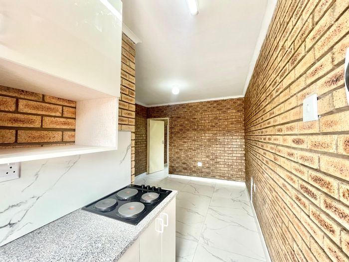 1-Bedroom Apartment To Rent in Tongaat Central with prepaid utilities and secure parking.