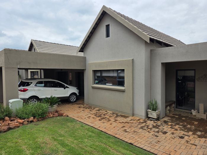 For Sale: Townhouse in Leloko Lifestyle & Eco Estate with garden, braai area, and parking.