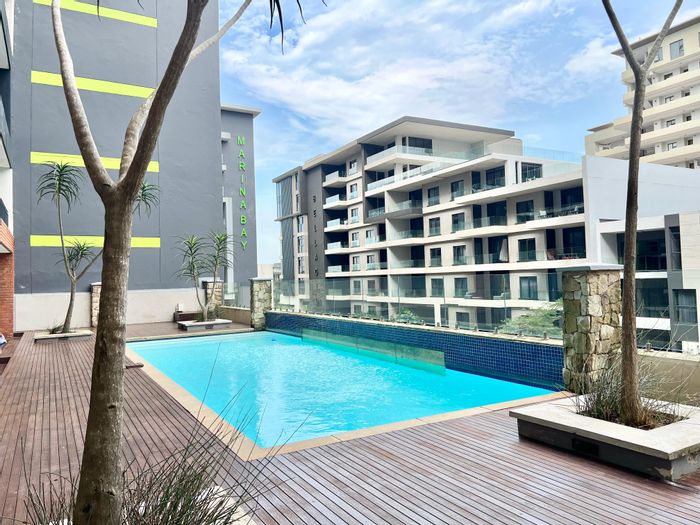 2-Bedroom Apartment To Rent in Umhlanga Central with Gym, Pool, and Laundry.