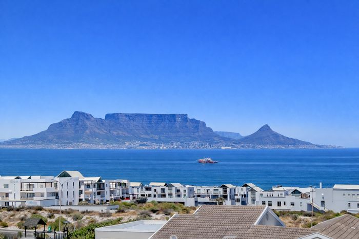 For Sale: Coastal Townhouse in Big Bay with ocean views, 4 bedrooms, double garage.