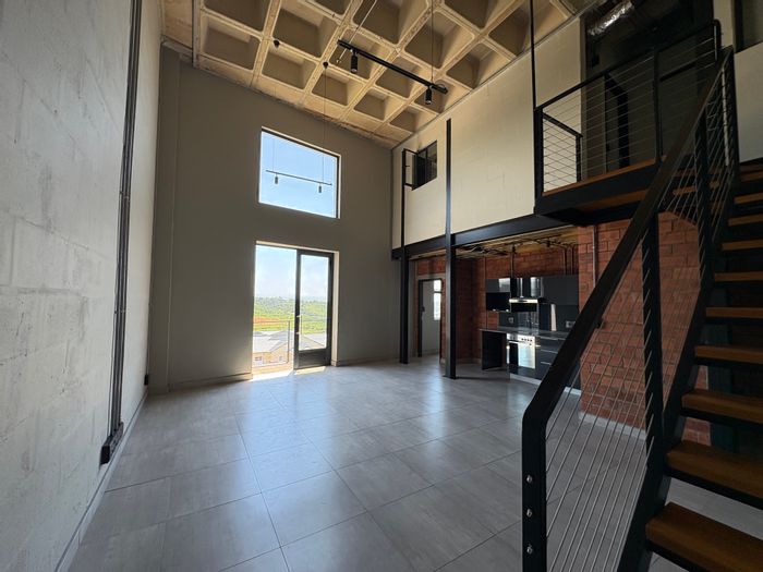 Ballito Central Apartment To Rent: Loft living above Odyssey Mall with amenities.