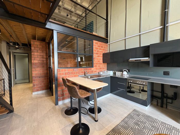 Ballito Central Apartment For Sale: Loft living above Odyssey Mall with amenities.