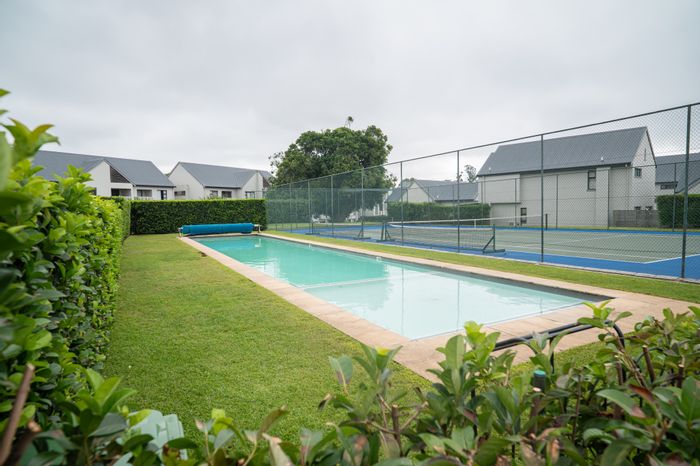 For Sale: 2-Bedroom Apartment at Emberton Estate with pool, tennis court, and security.