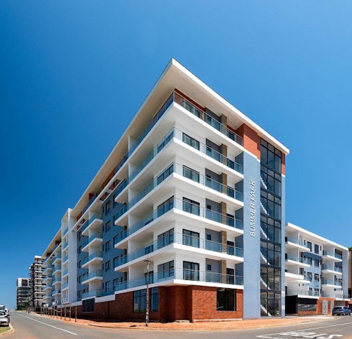 2-Bedroom Apartment To Rent in Umhlanga Ridge with pool, balcony, and parking.