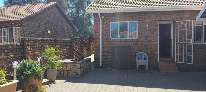 For Sale: Townhouse in Norkem Park with 3 beds, security, pool, and garages.