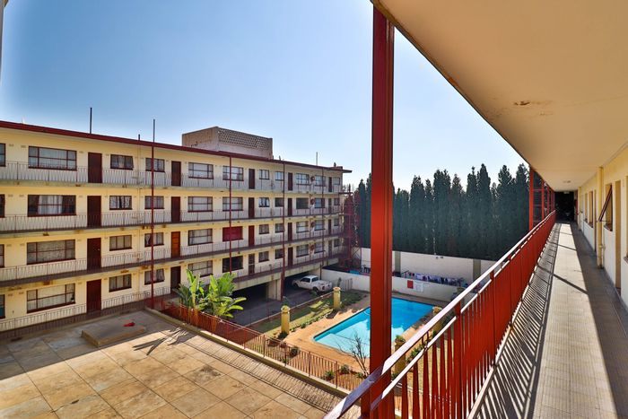 Kensington B Apartment For Sale: 2 beds, garden view, covered parking, spacious layout.