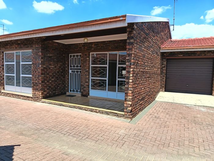 For Sale: Three Rivers Townhouse with 2 beds, private courtyard, and garage.