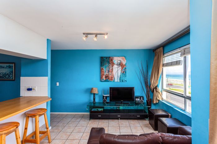 Table View Apartment For Sale: Beachfront, sea views, Airbnb-friendly, secure complex.