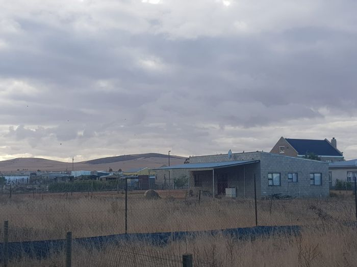 2-Bedroom House To Rent in Moorreesburg Central with secure parking and utilities included.