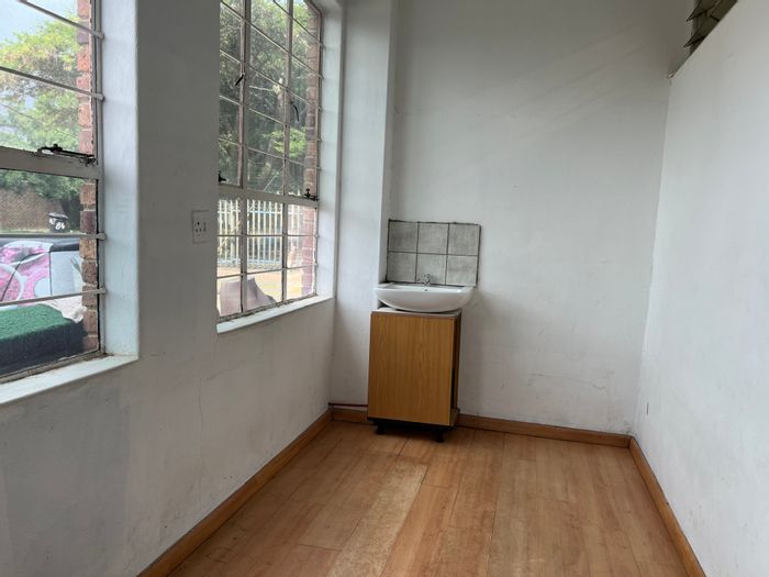 Northcliff Apartment To Rent: Convenient layout, kitchen, and dual toilets included.