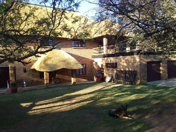 Farm for Sale in Mnandi: Spacious home, cottage, gardens, and ample storage.