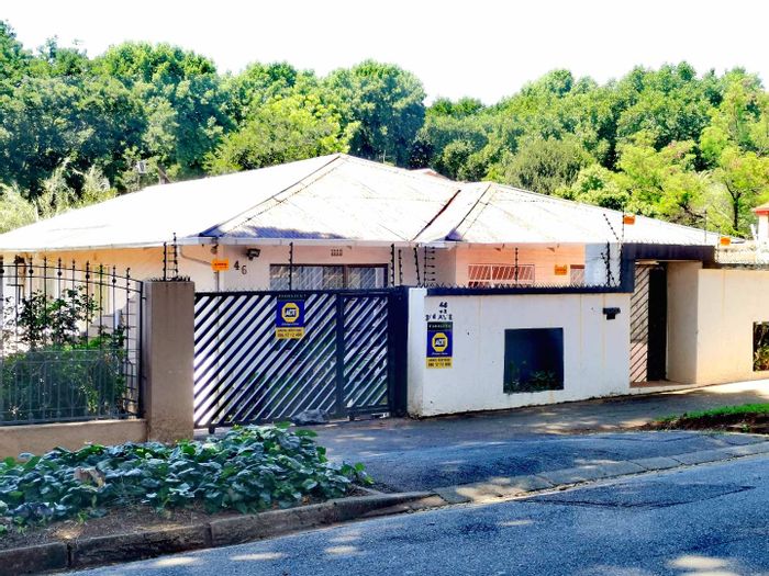 4-Bedroom House For Sale in Bezuidenhout Valley with alarm, garage, and potential expansion.