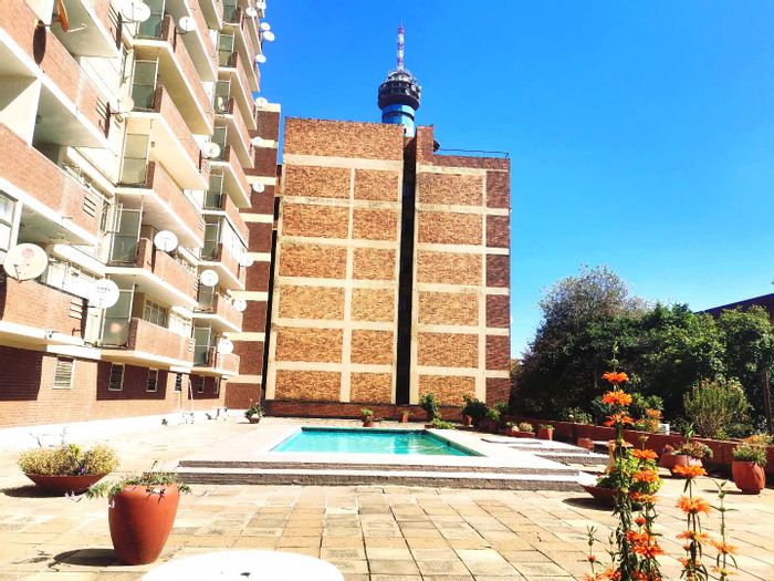 For Sale: 2-bedroom apartment in Berea with rooftop flatlet and secure garage.