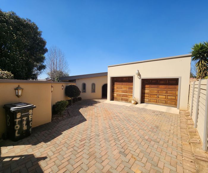 For Sale: Birchleigh House with 4 bedrooms, pool, outdoor area, and dual garages.