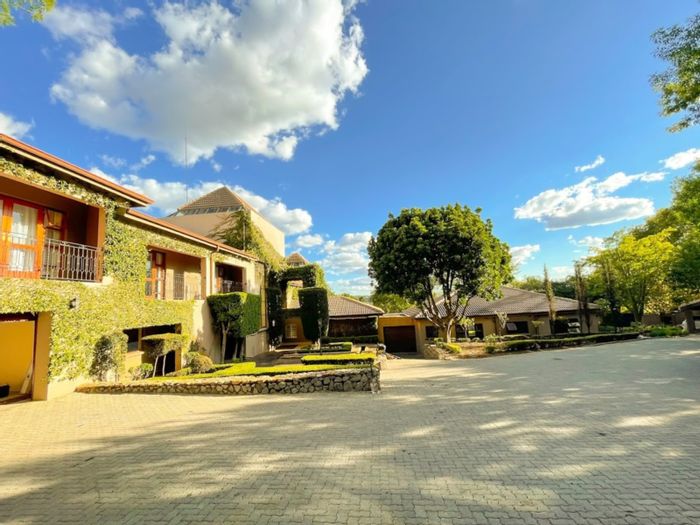 Bryanston House For Sale: Spacious home with cottages, pool, tennis court, and gardens.