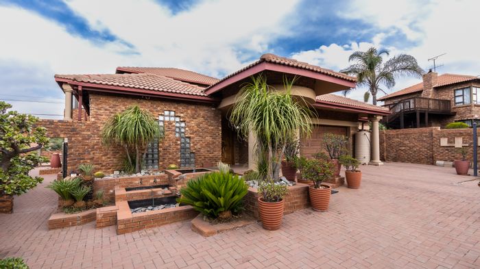 For Sale: House in Highveld with pool, gym, and low-maintenance yard.