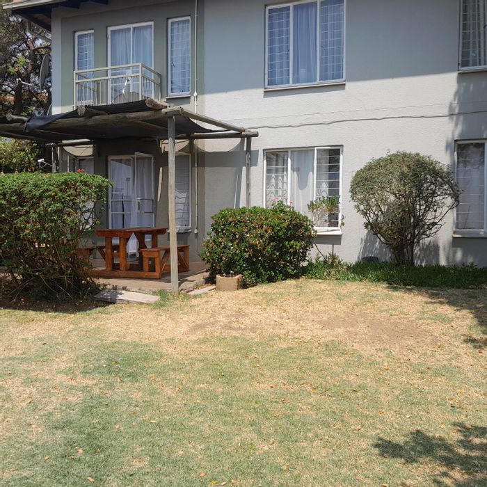 3-Bedroom Apartment To Rent in Radiokop with secure parking and gardens.