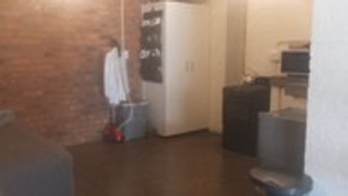 For Sale: Ground floor studio apartment in Maboneng with rental income potential.