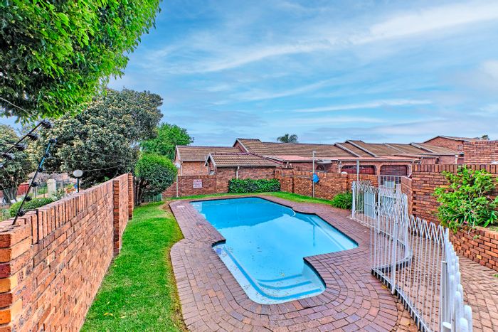 For Sale: 3 Bed, 2.5 Bath Townhouse in Corlett Gardens with pool, pet-friendly.