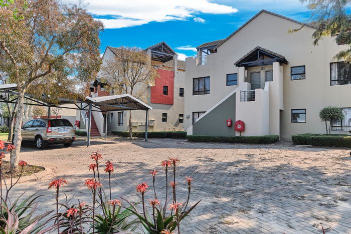 For Sale: Bryanston Apartment with 2 beds, private patio, secure parking.