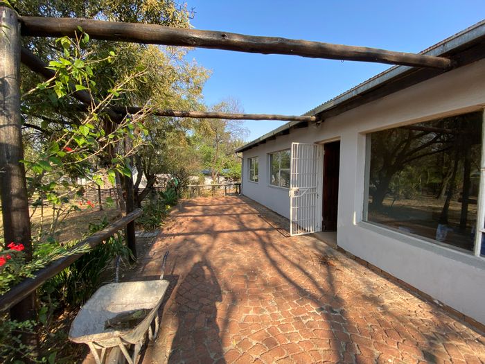 3-Bedroom Cottage To Rent in Glen Austin AH with open-plan living and parking.