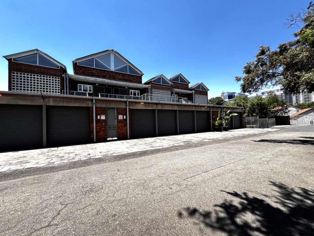 Garages with Sandton city in background