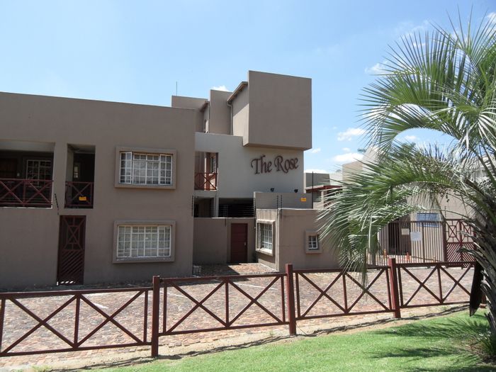 Spacious 3-bedroom townhouse in Corlett Gardens with private gardens and security. For Sale.