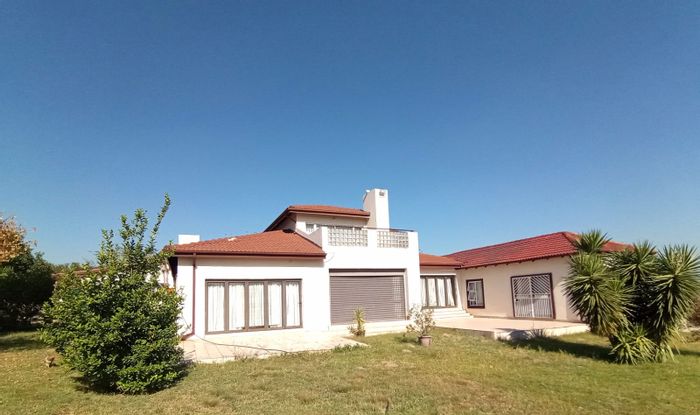 Farm for Sale in Doornrandje: 3-bed residence, borehole, stables, security features.