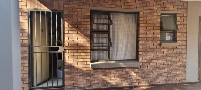 Cozy 2-Bedroom Apartment in Bloubosrand For Sale with Security and Convenience!