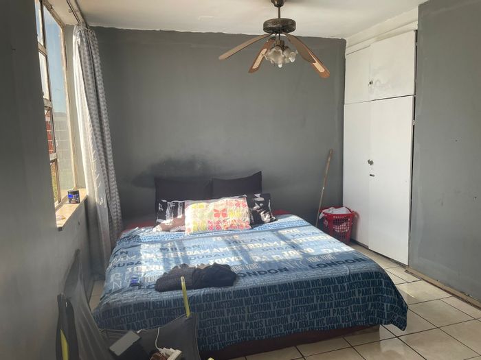 Duplex apartment in Sunnyside with rooftop, spacious living, and rental potential. For Sale.