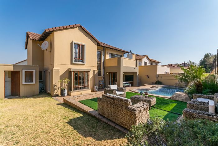 For Sale: House in Kyalami Hills with pool, garage, and spacious garden.