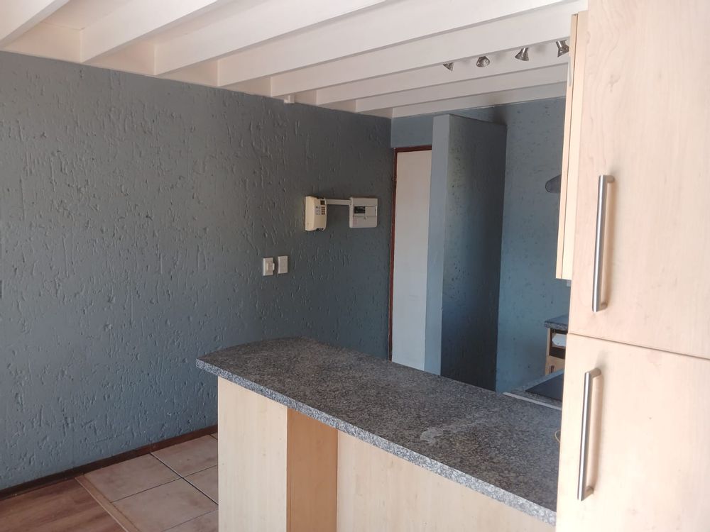 Kitchen counter looking towards front door