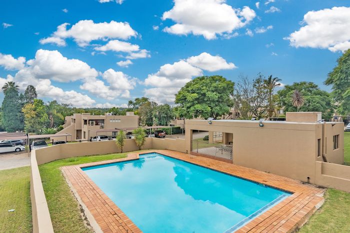 For Sale: Morningside Townhouse with balcony, pool access, and 24-hour security.