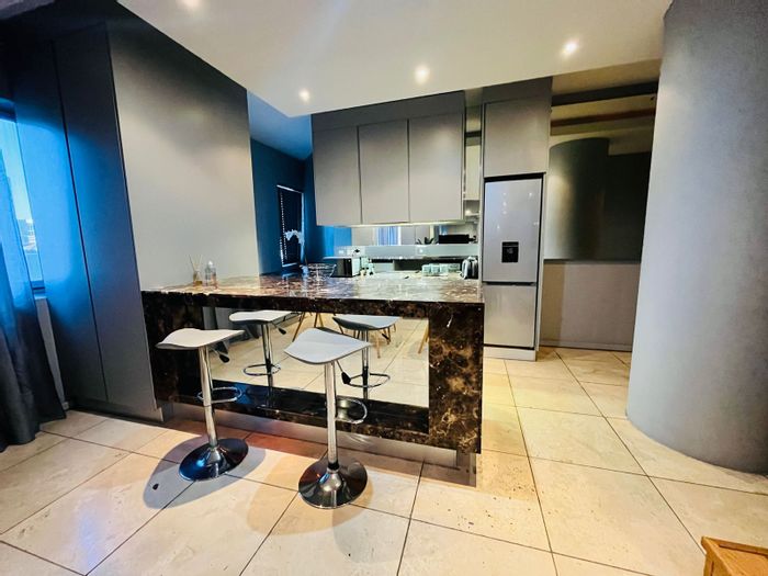 Luxury apartment for sale in Johannesburg Central with 24-hour security and amenities.