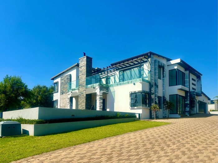 For Sale: House in Copperleaf Estate with 5 en-suite bedrooms, pool, and golf access.