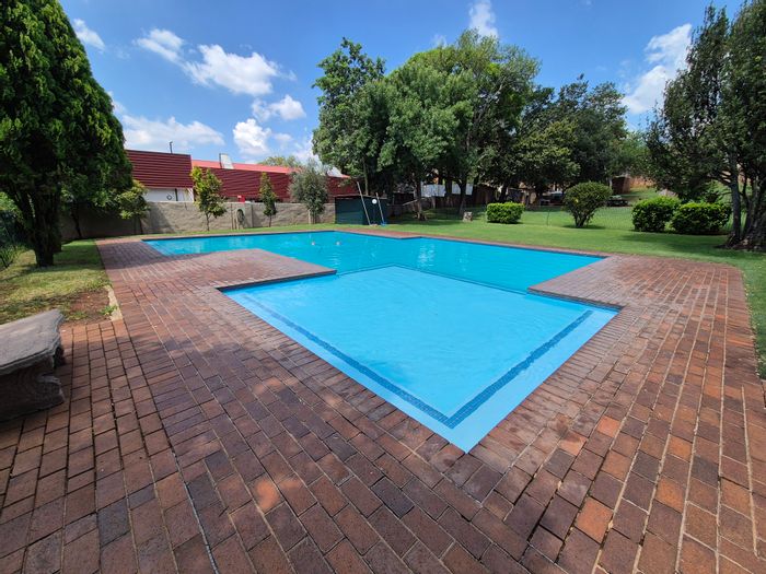 For Sale: 2-Bedroom Apartment in Hennopspark with Private Garden and Secure Complex.