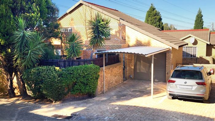 Olivedale Townhouse For Sale: 1-bedroom duplex with private garden and community amenities.