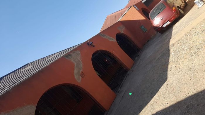 Turffontein House For Sale: 4 bedrooms, 5 rental units, secure outdoor space.