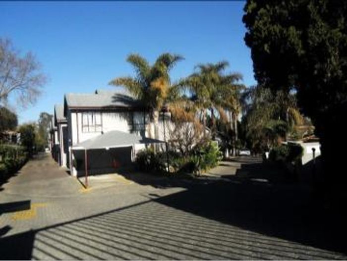 For Sale: Townhouse in Corlett Gardens with pool, 2 beds, and garden access.