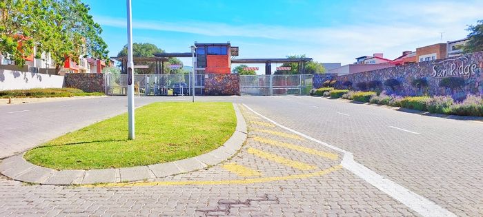 1-Bedroom Apartment For Sale in Carlswald with pool, security, and balcony access.