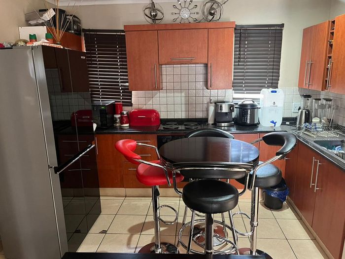 2-Bedroom Townhouse in Bendor For Sale with secure estate living and garage.