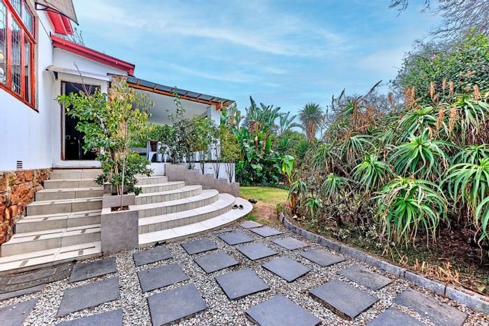 For Sale: Observatory House with 6 rental units, pool, gardens, and income potential.