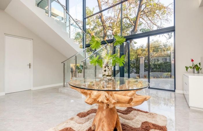 Spacious Bryanston house for sale: 4 bedrooms, large garden, solar features.