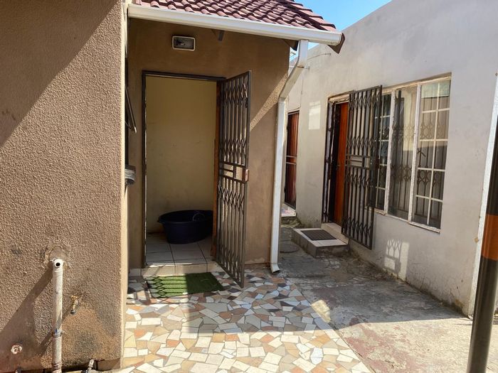 8-bedroom house for sale in Cosmo City, fully tenanted with rental income.