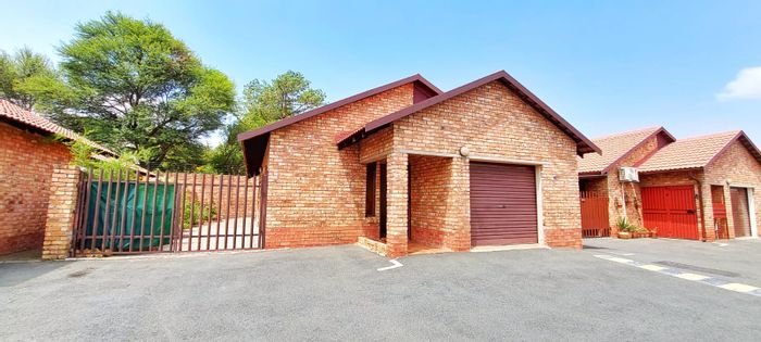Cluster home for sale in Halfway Gardens with 2 beds, security, and garden.